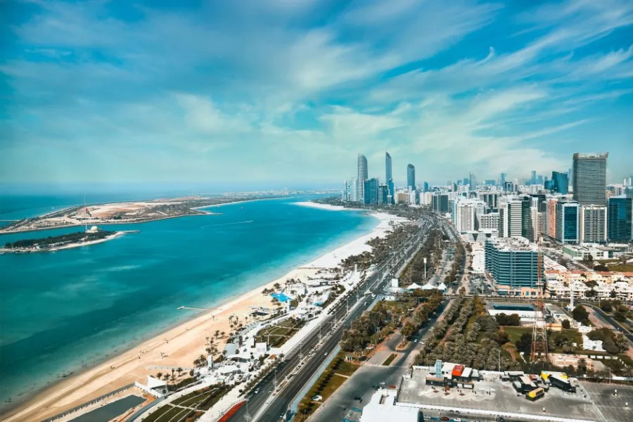 Breathtaking aerial image capturing the modern skyline and beautiful coastline of Abu Dhabi.